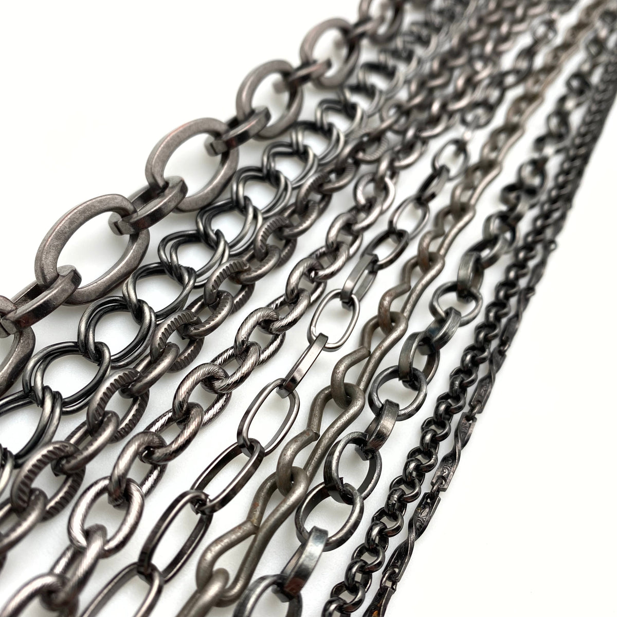 Gunmetal Black 12mm Round Flat Link Chain sold by the foot at   Chain0003GM